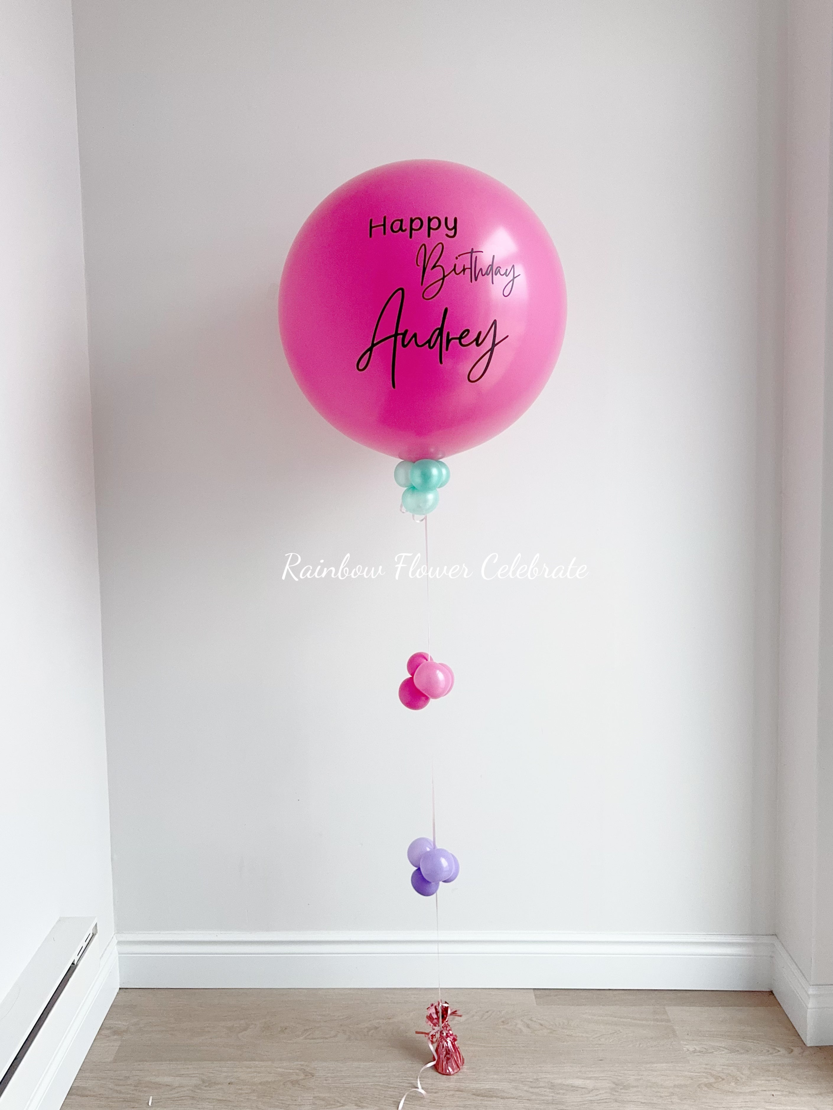 Hot Pink balloon with 'Happy Birthday Audrey' text on a 24 inches latex helium balloon