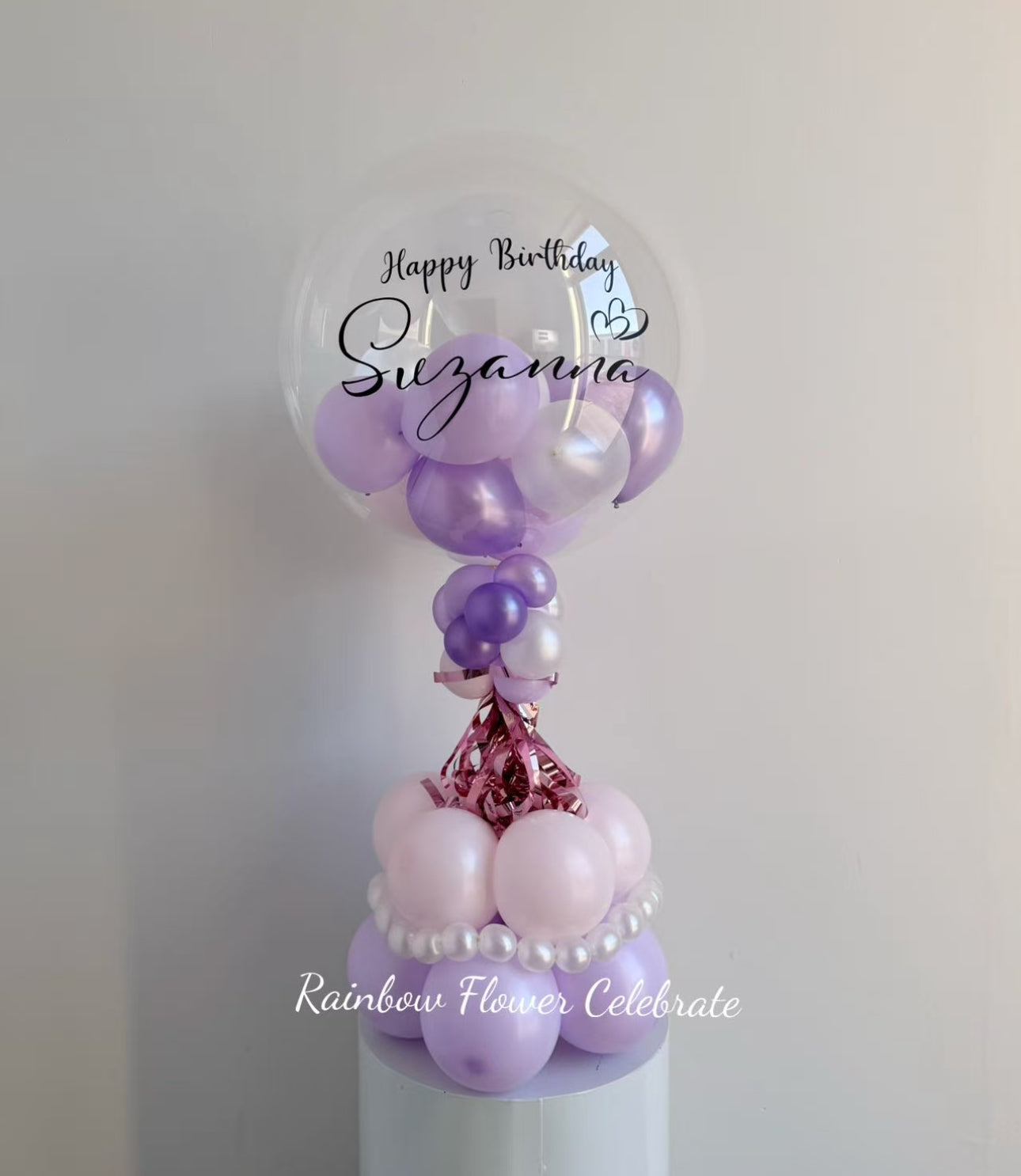 Decorative pink purple and pearl white balloon with personalized Happy Birthday on a clear balloon with mini balloon inside, great for table top and centrepiece balloon decoration for birthday.