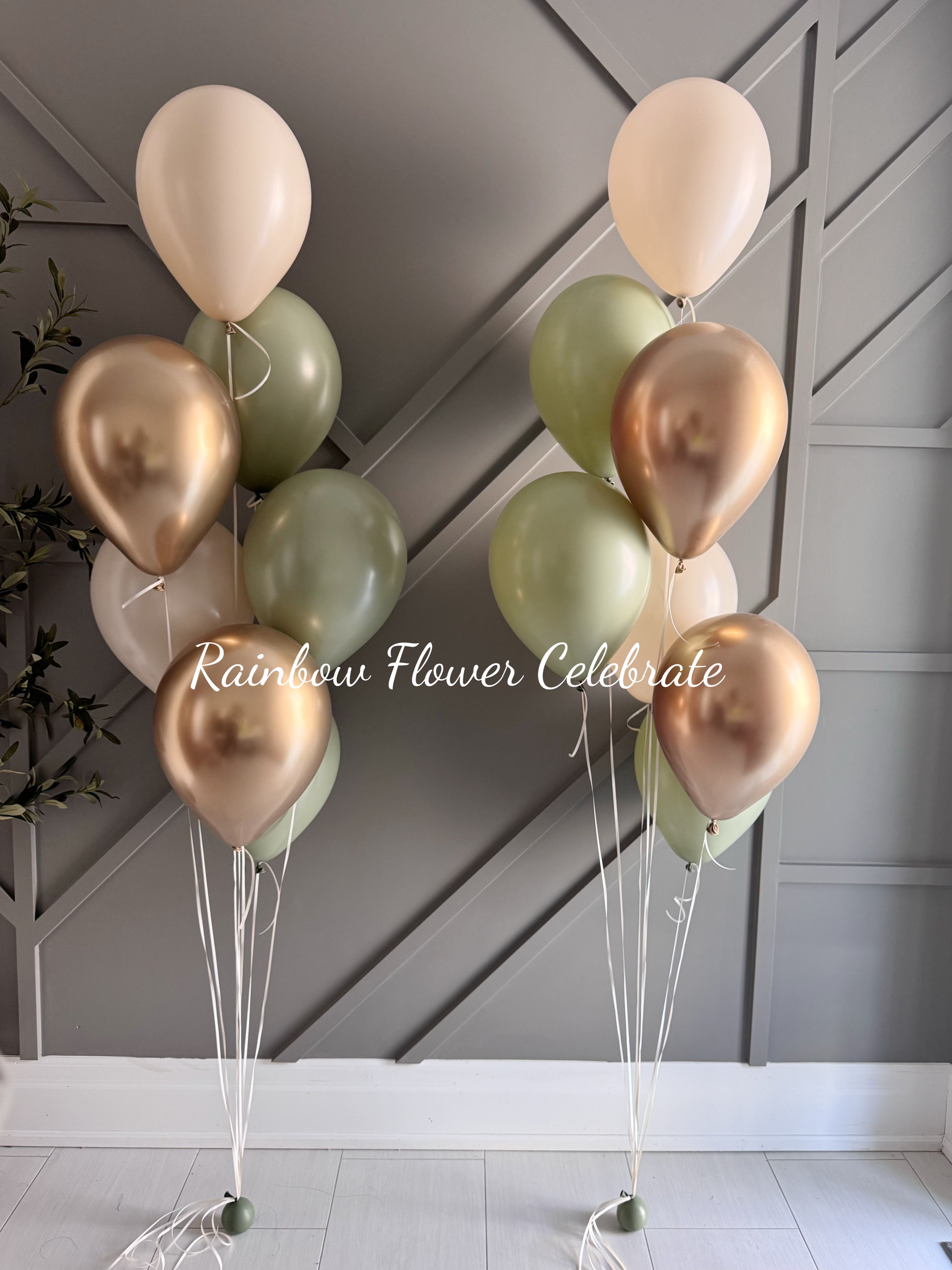 Elegant balloon bouquet in gold, cream, and sage for celebrations or event decoration