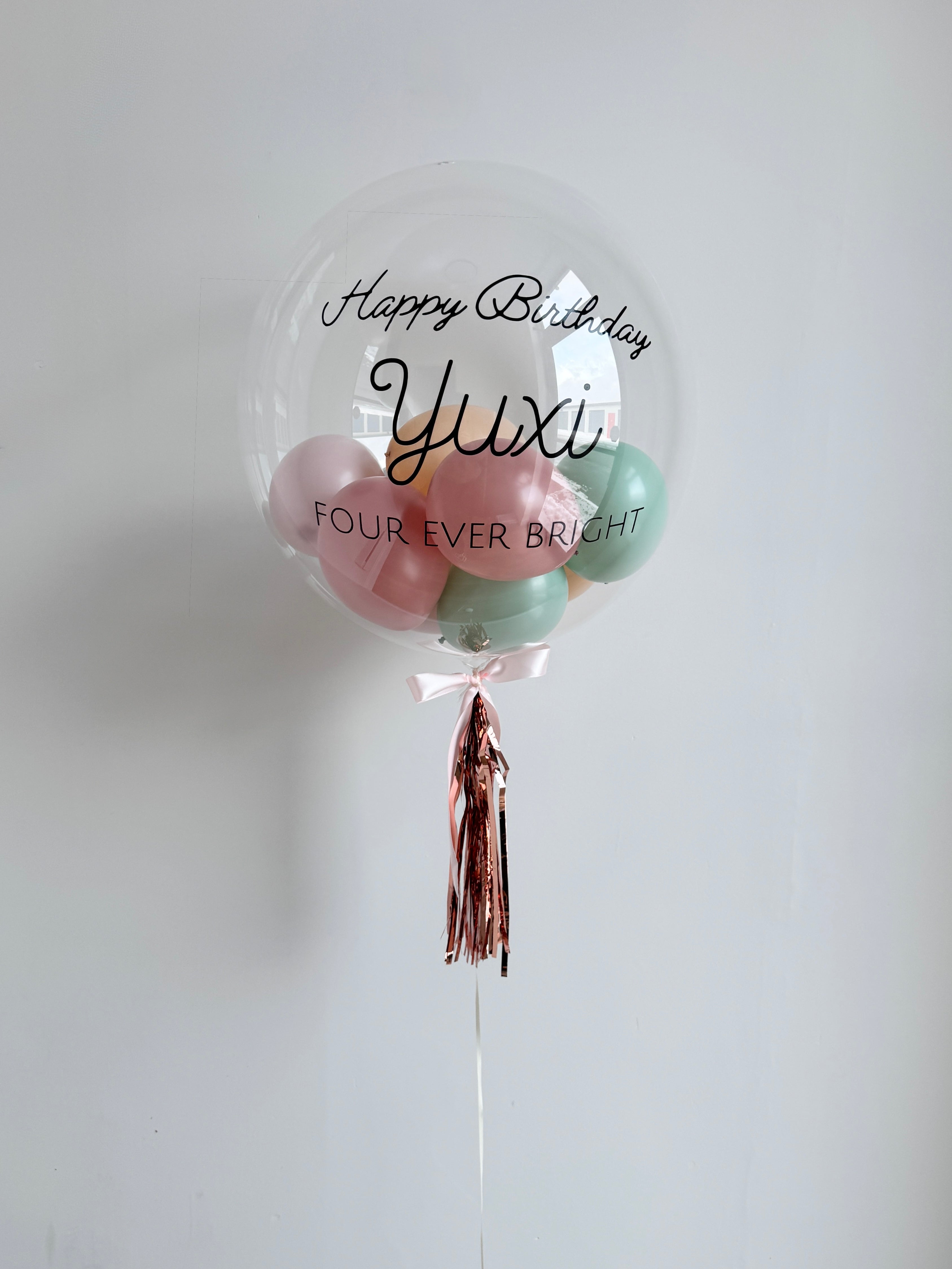 20-22 Inches Clear BoBo balloon with mini stuffed balloons and personalized Message