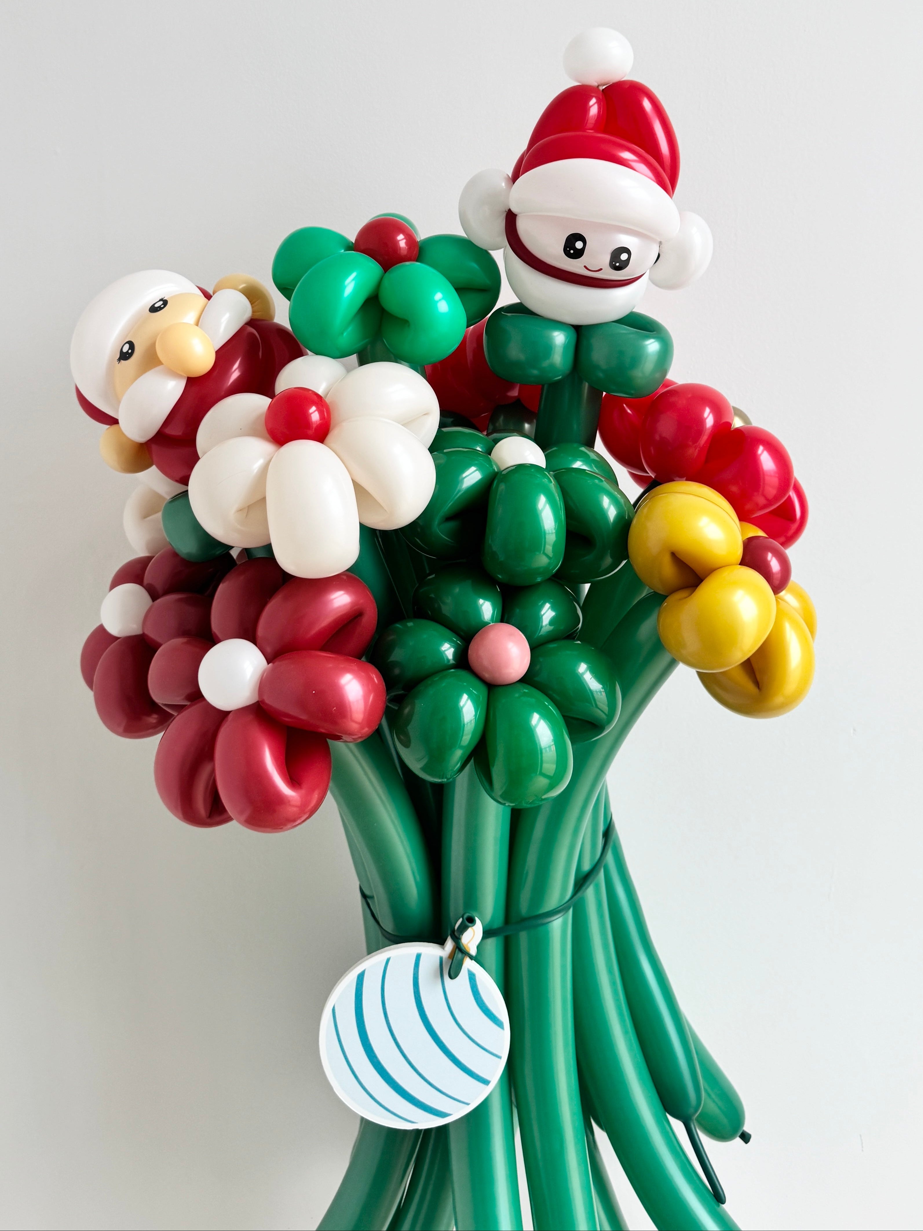 Balloon flower bouquet in red, green, yellow colour with Santa Claus, snowman figures 
