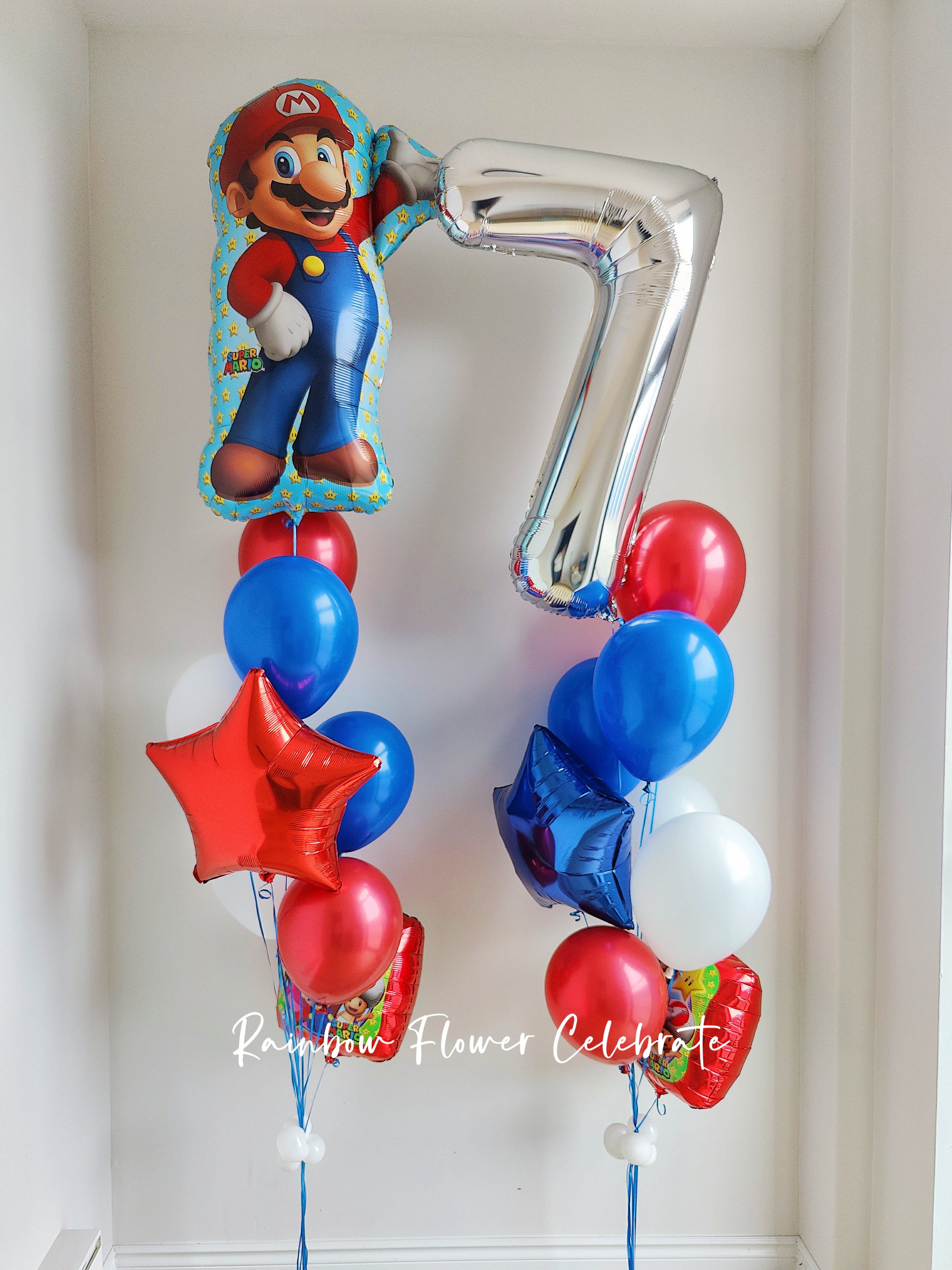 Super mario foil balloon and silver number 7 with red and blue latex balloons