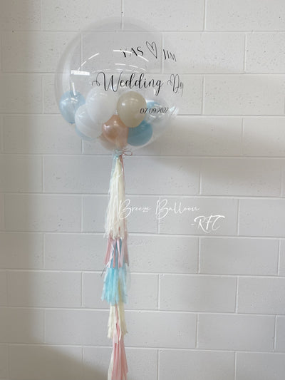 Large personalized Bobo balloon with tassel
